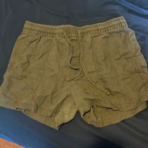 Olive green linen shorts.